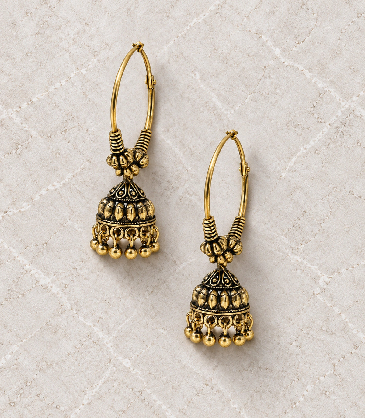 JIMIKI Antique Gold Three Bead Hoop Leaf Jhumka Earrings in Antique Gold - editorial flatlay #color_antique-gold