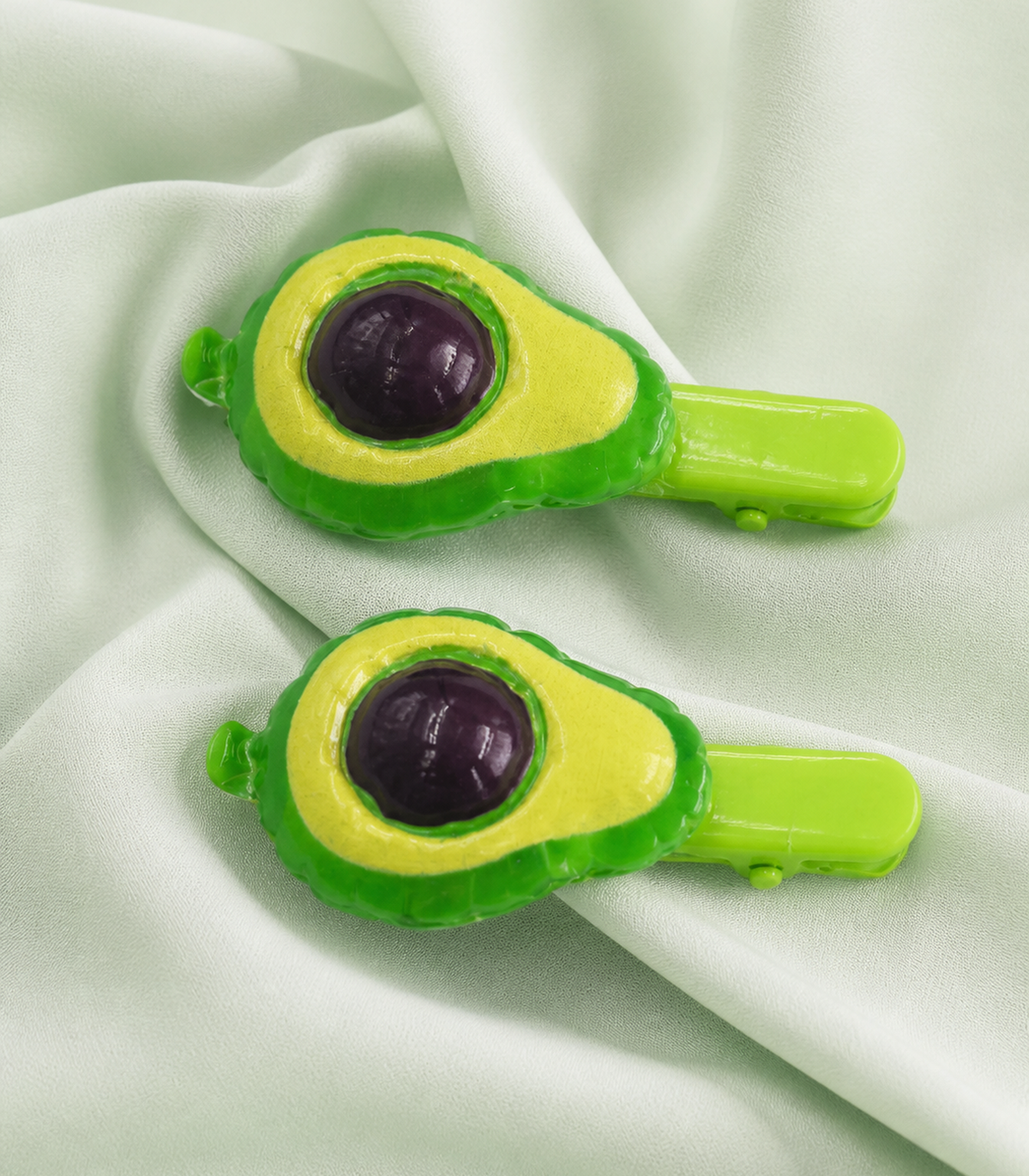 JIMIKI Raised Avocado Green Clip Pair in Green / Dark Brown, close-up detail