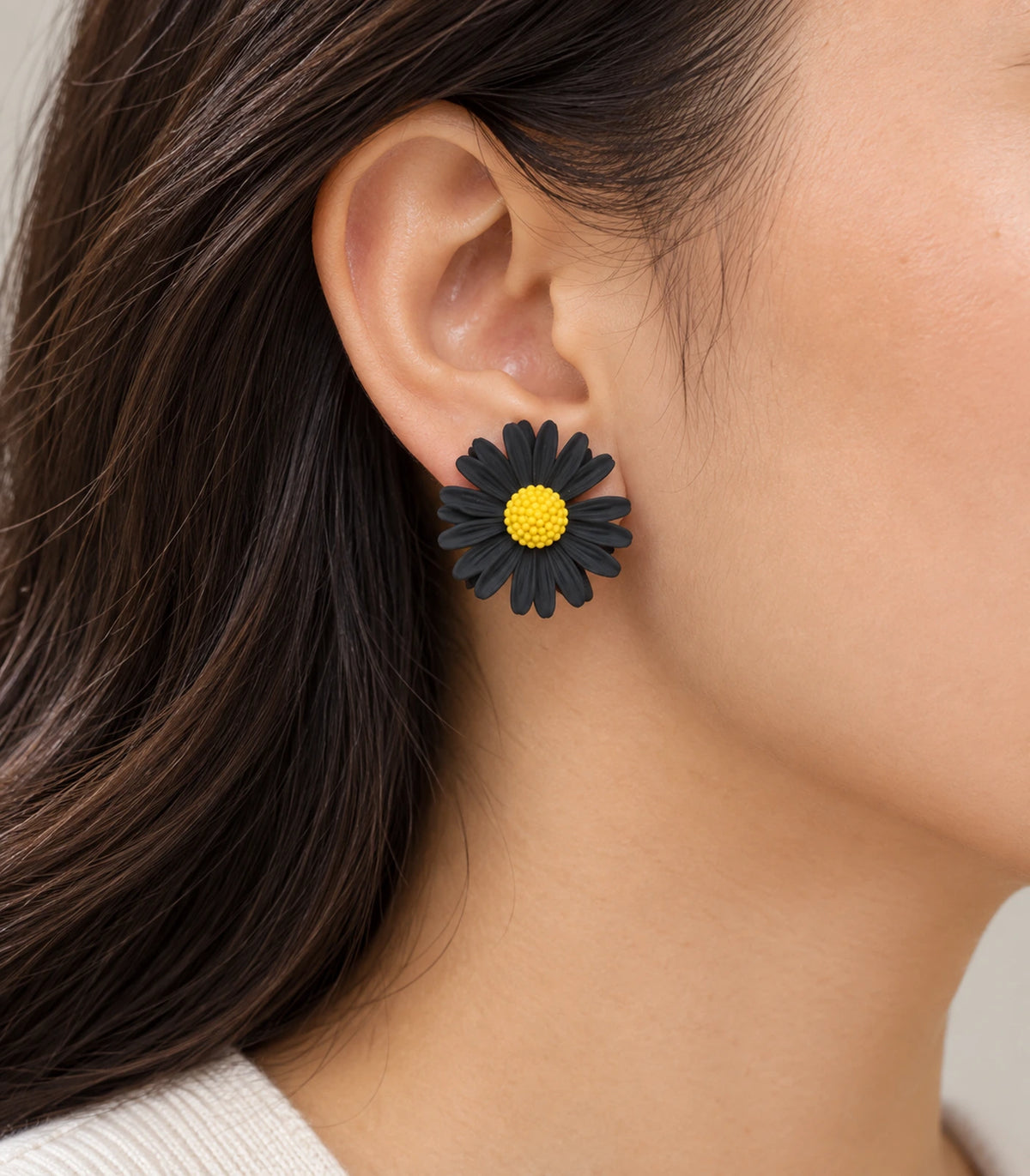 JIMIKI Black yellow centre daisy stud earrings, stud worn on the ear #color_black