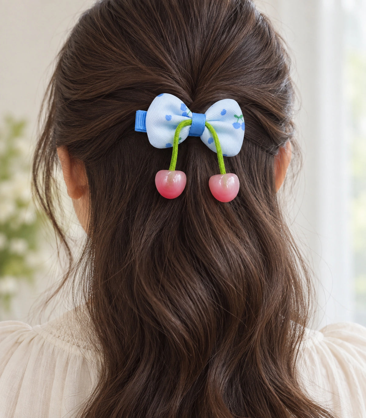 JIMIKI Cherry Print Bow Hair Clip With Cherry Charms in Blue, model wearing view #color_blue