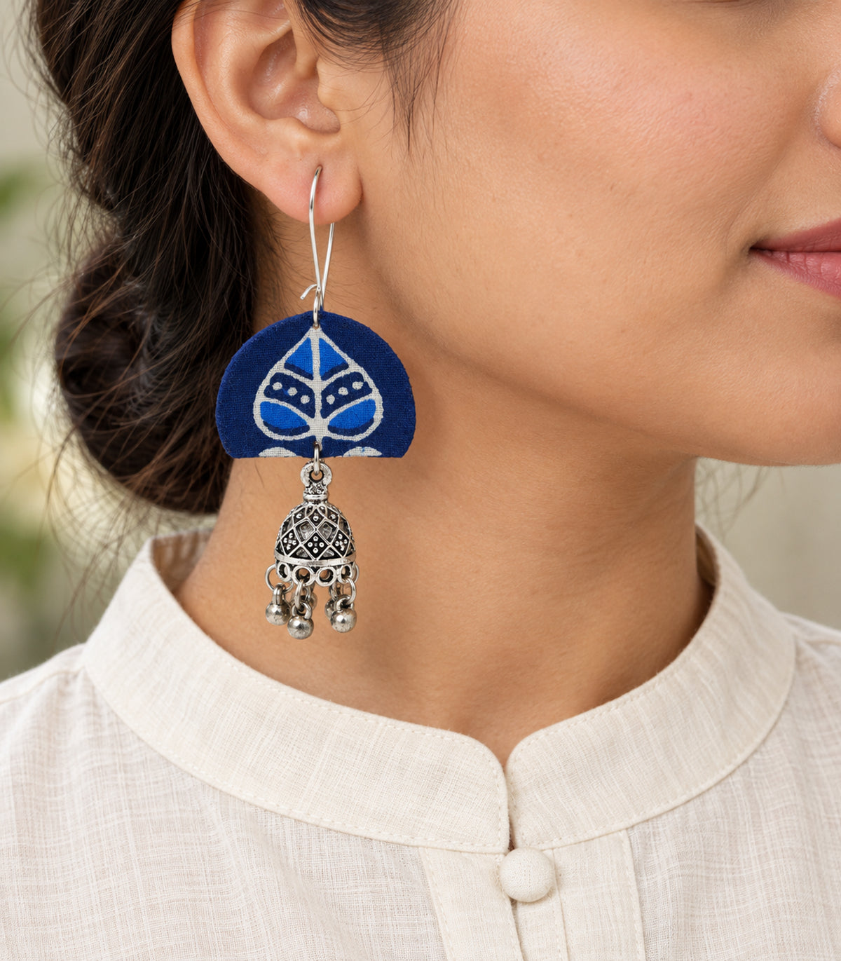 Blue Leaf Fabric Jhumka Earrings — closeup view