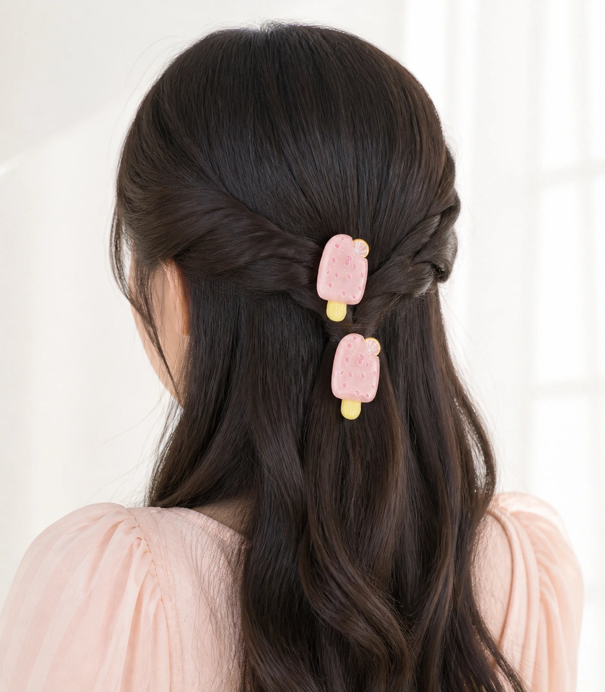 Editorial model view of the Blush Pink Citrus Popsicle Clip Pair