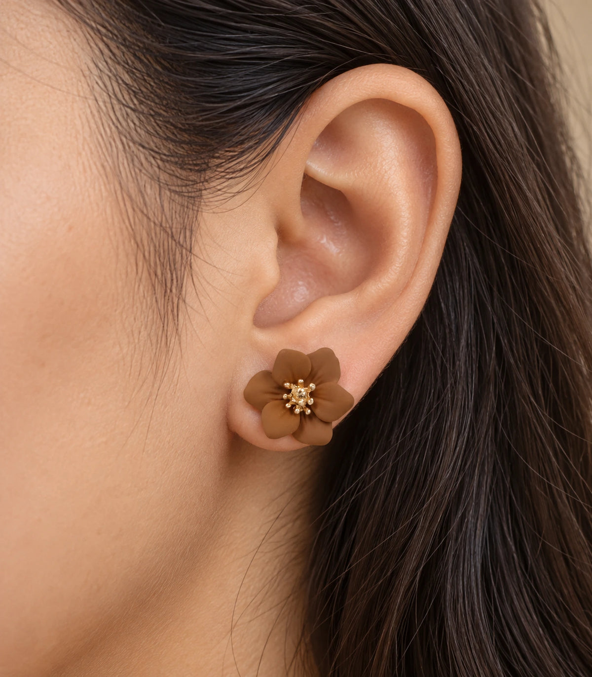JIMIKI Camel compact six petal flower stud earrings, close-up of six rounded petals and gold-tone centre #color_camel