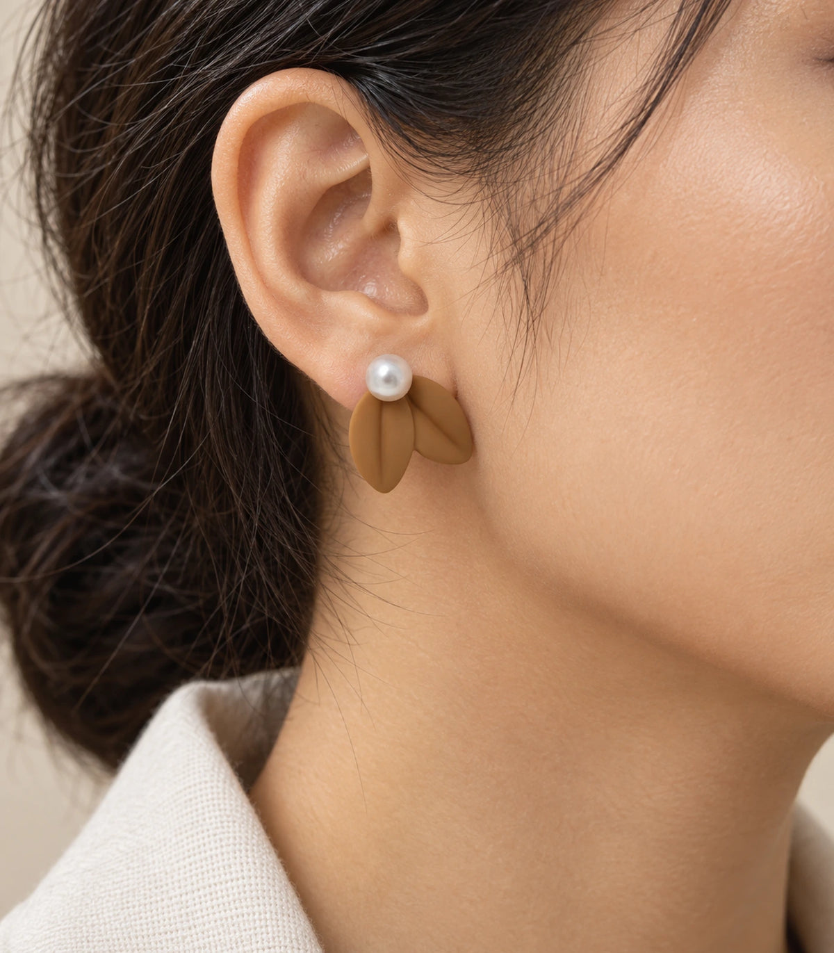 JIMIKI Double Leaf Pearl Stud Earrings in Camel — earrings worn on the ear #color_camel