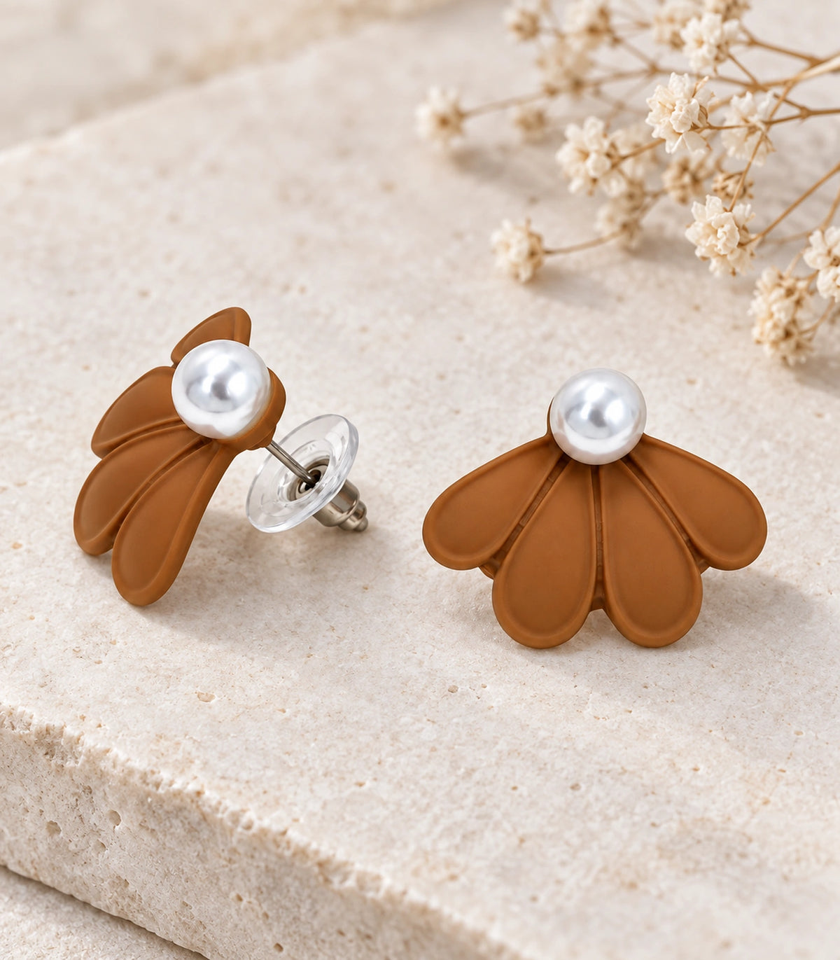 JIMIKI Camel pearl fan petal stud earrings, pair in an editorial flat lay #color_camel