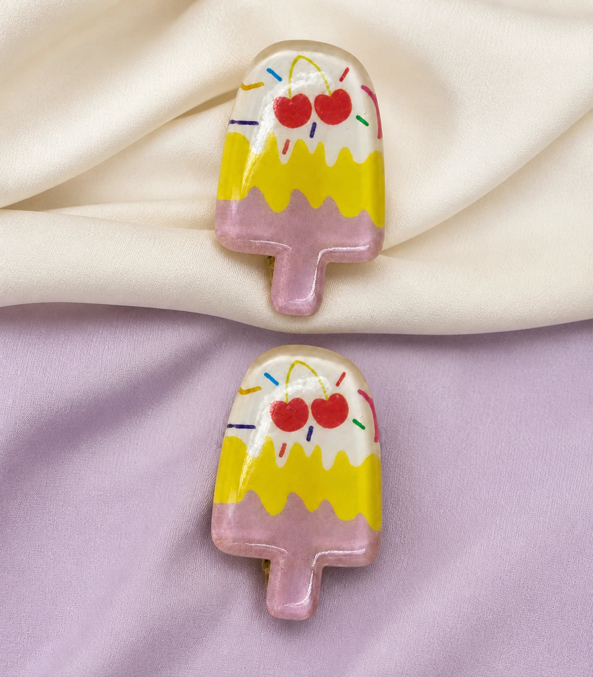Close-up of the Cherry Sprinkle Layered Popsicle Clip Pair details