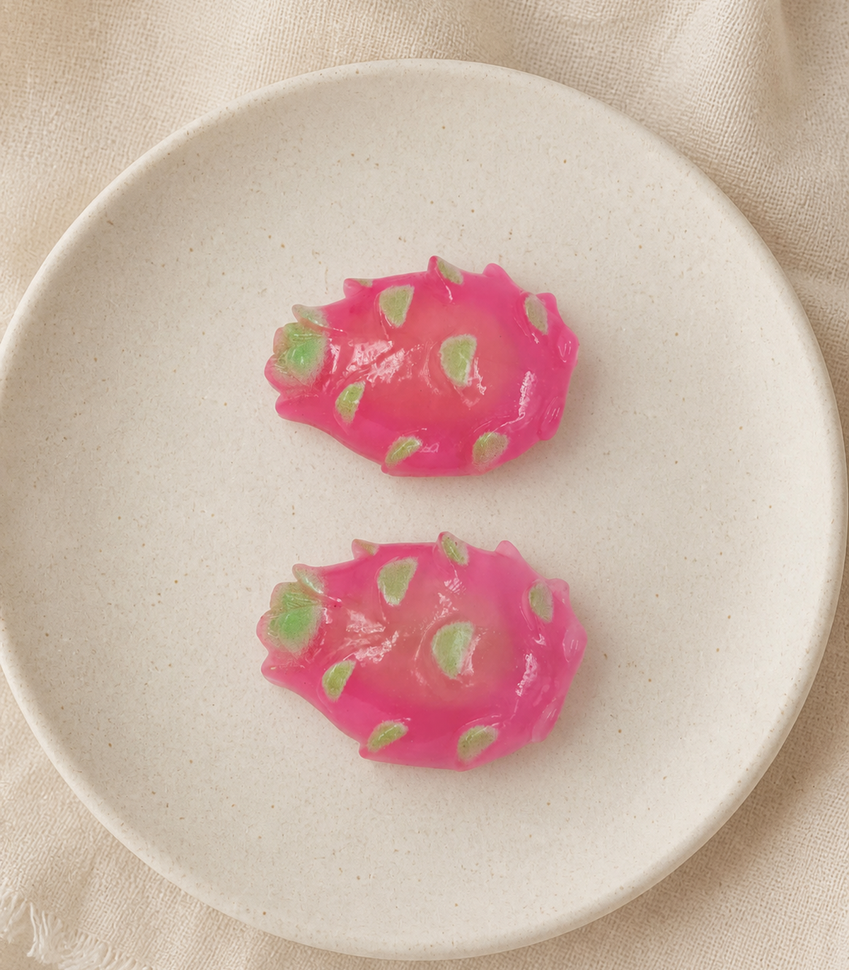 Dragon Fruit Barrette Pair editorial flat lay