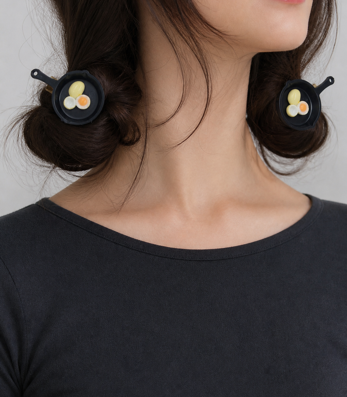 JIMIKI Egg Trio Frying Pan Barrette Pair in Black / Cream / Orange, worn hairstyle view