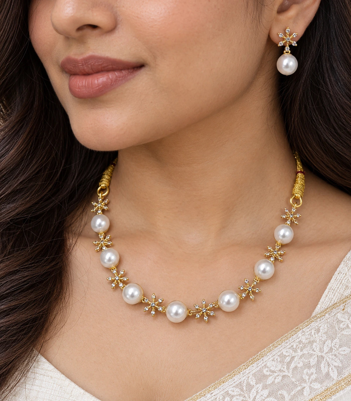 Gold Clear Floral Pearl Necklace Set closeup in a worn composition