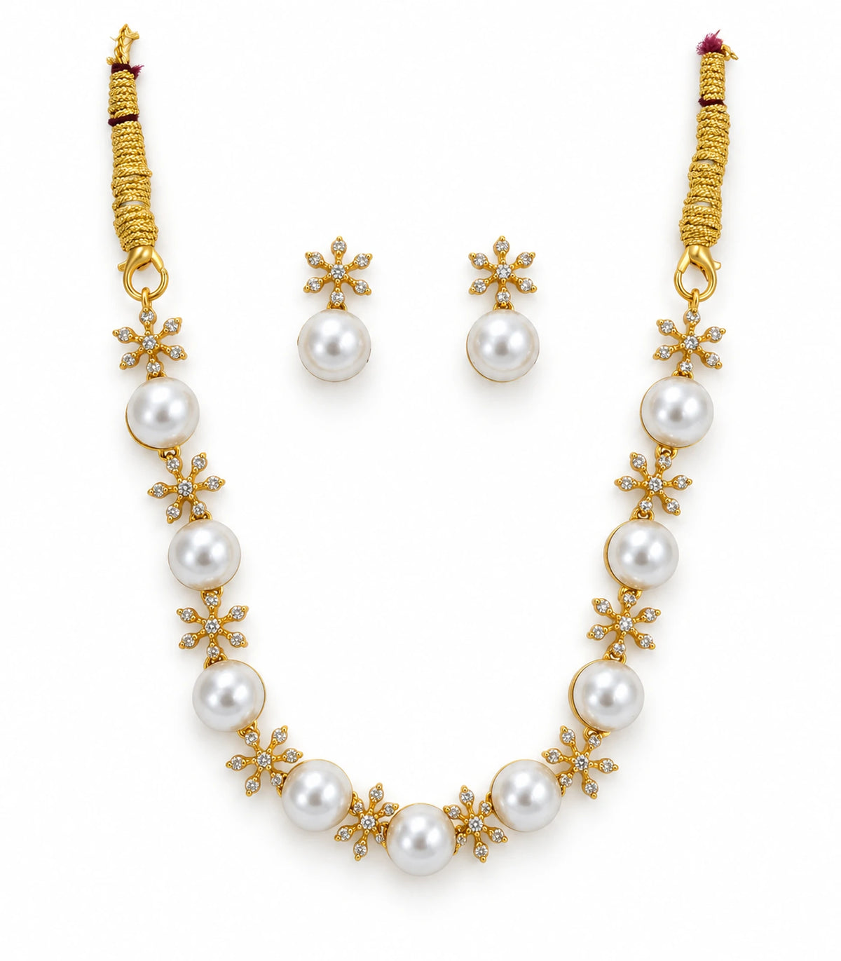 Gold Clear Floral Pearl Necklace Set with necklace and matching pair of earrings on white