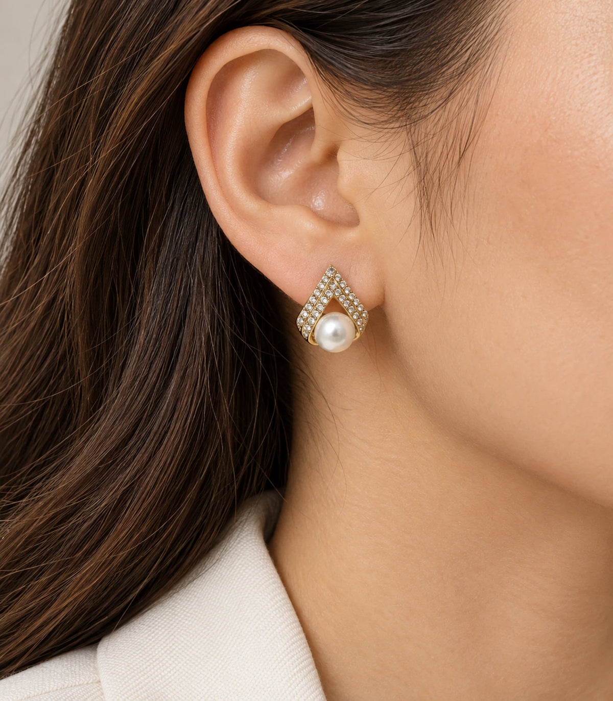 JIMIKI Gold Crystal Teardrop Pearl Earrings — worn styling view #color_gold-tone