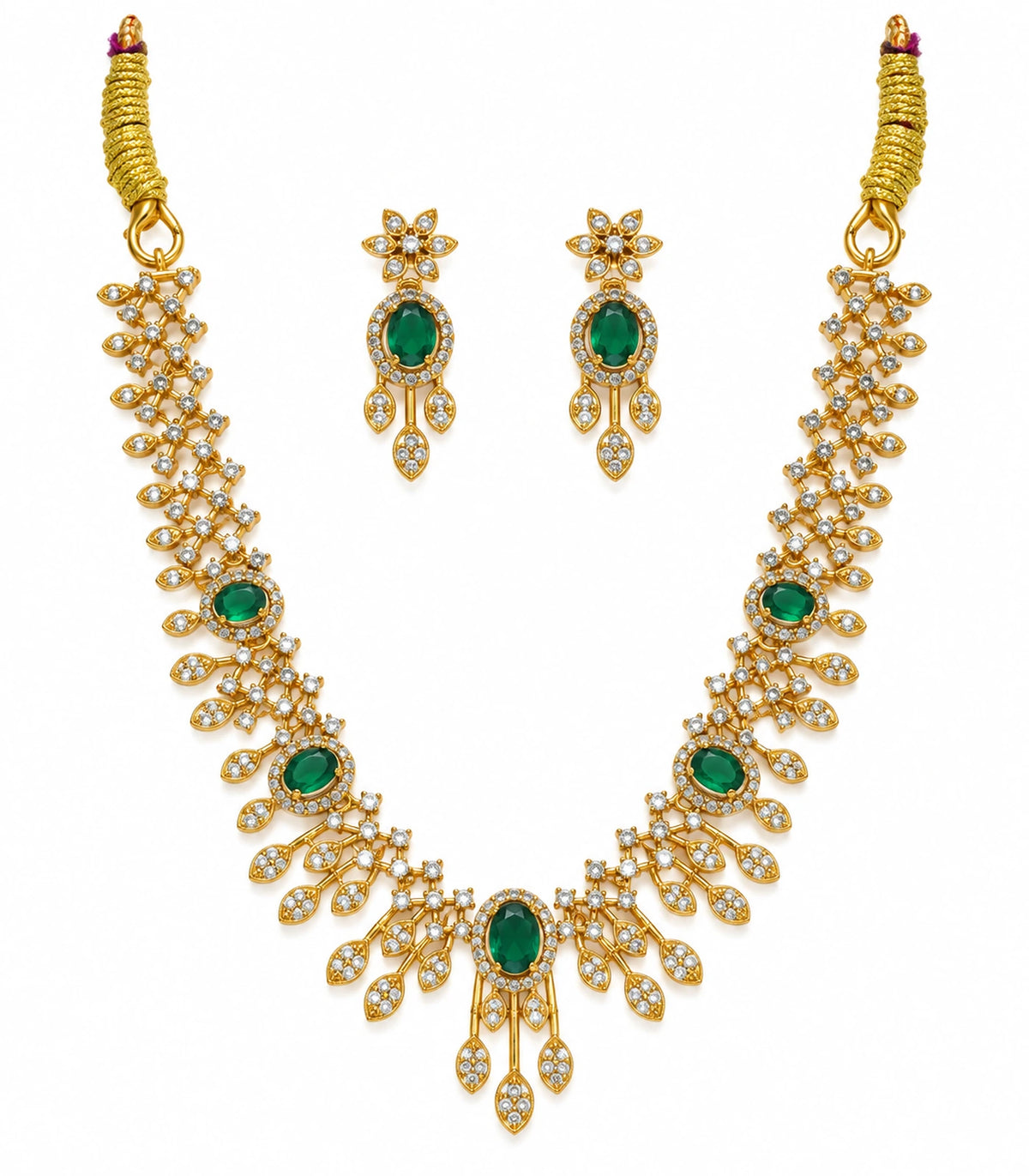 Gold-tone emerald-green floral fringe necklace with matching pair of earrings on white