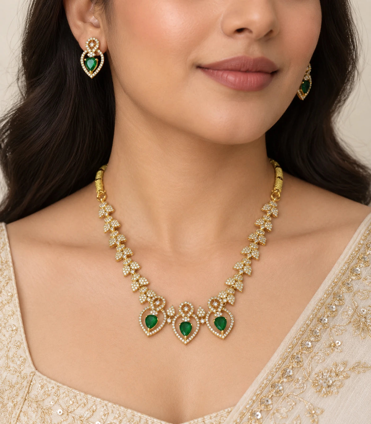 Gold Emerald Heart Crystal Necklace Set worn with matching earrings