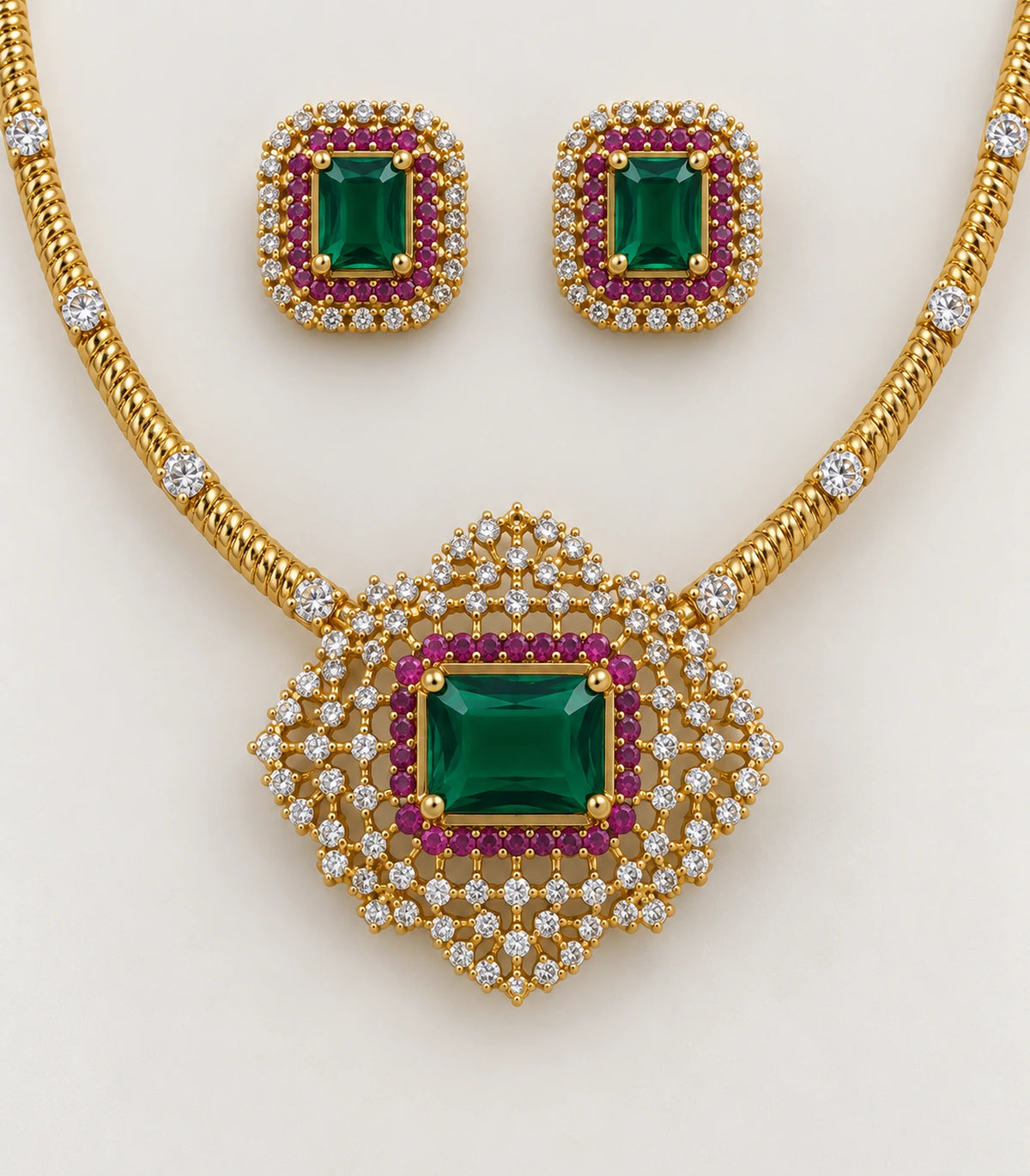 Close view of the green centre, magenta surround and clear accents on the necklace and matching stud pair