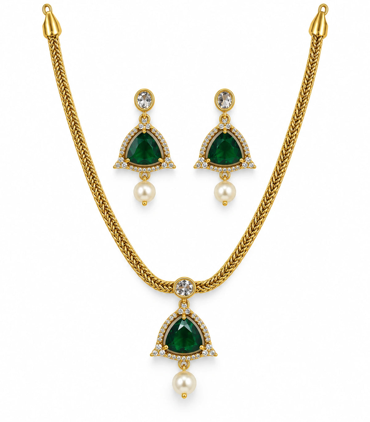 Gold-tone necklace and two matching emerald-green halo pearl-drop earrings on white