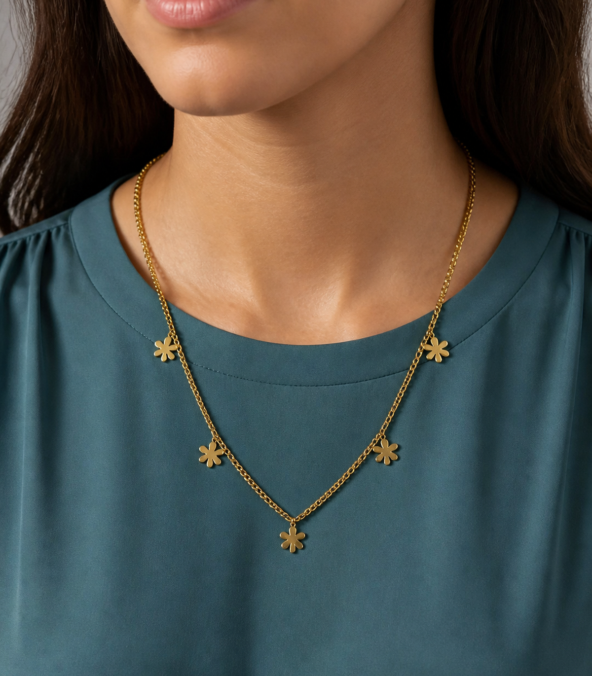 Gold Five Flower Chain Necklace styled on a model