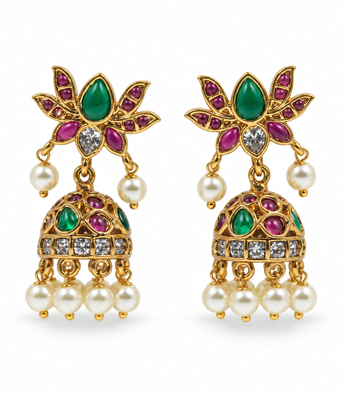 Pair of gold-tone lotus jhumka earrings with green and magenta accents and pearl-like drops on white