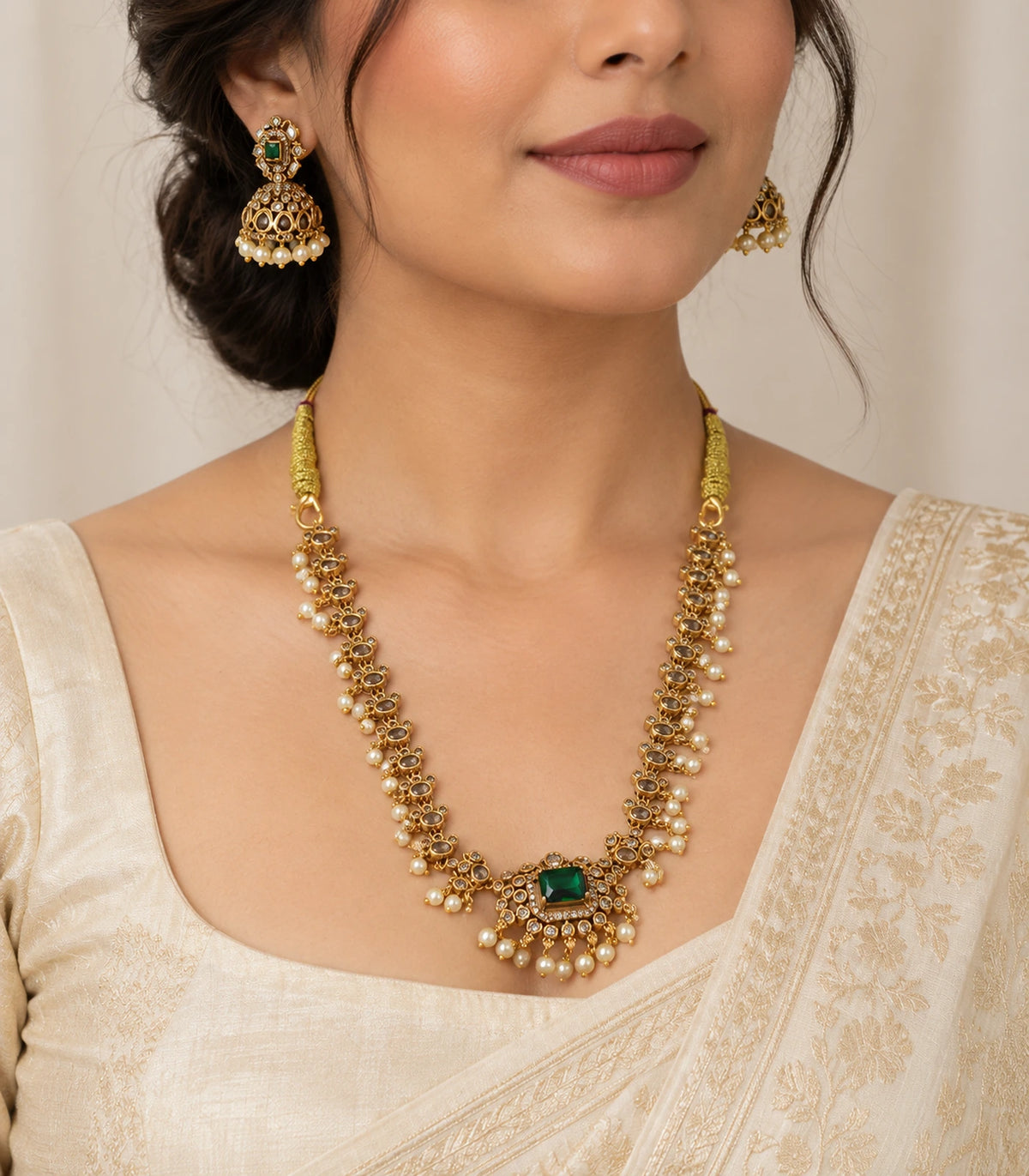 Gold Green Pearl Floral Necklace Set worn with an ivory outfit