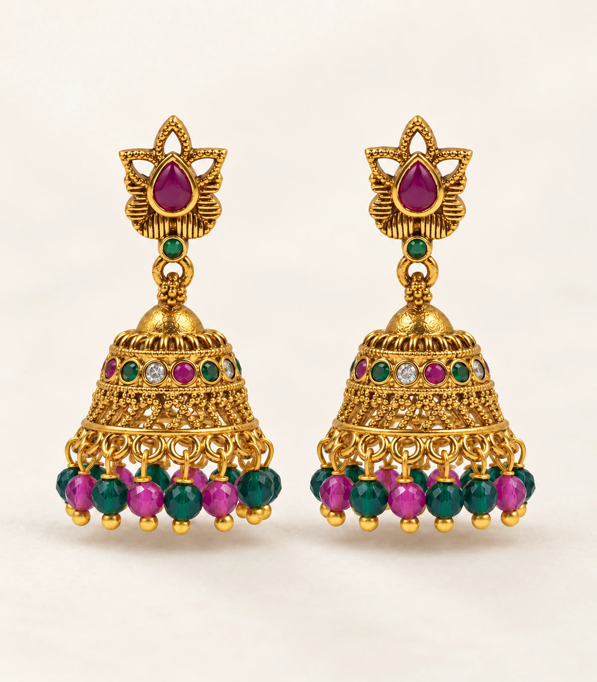 Gold Magenta Crystal Chandbali Pearl Earrings — editorial flatlay view