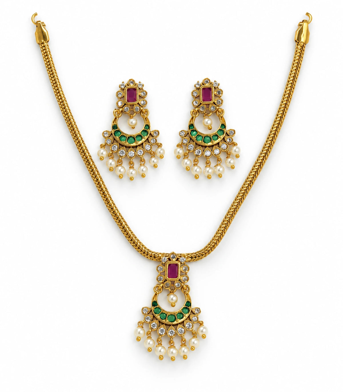 Gold-tone magenta and green necklace with a matching pair of pearl-drop earrings on white
