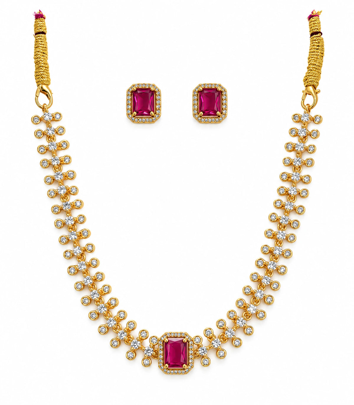 Gold-tone magenta crystal necklace and two matching stud earrings on a white background
