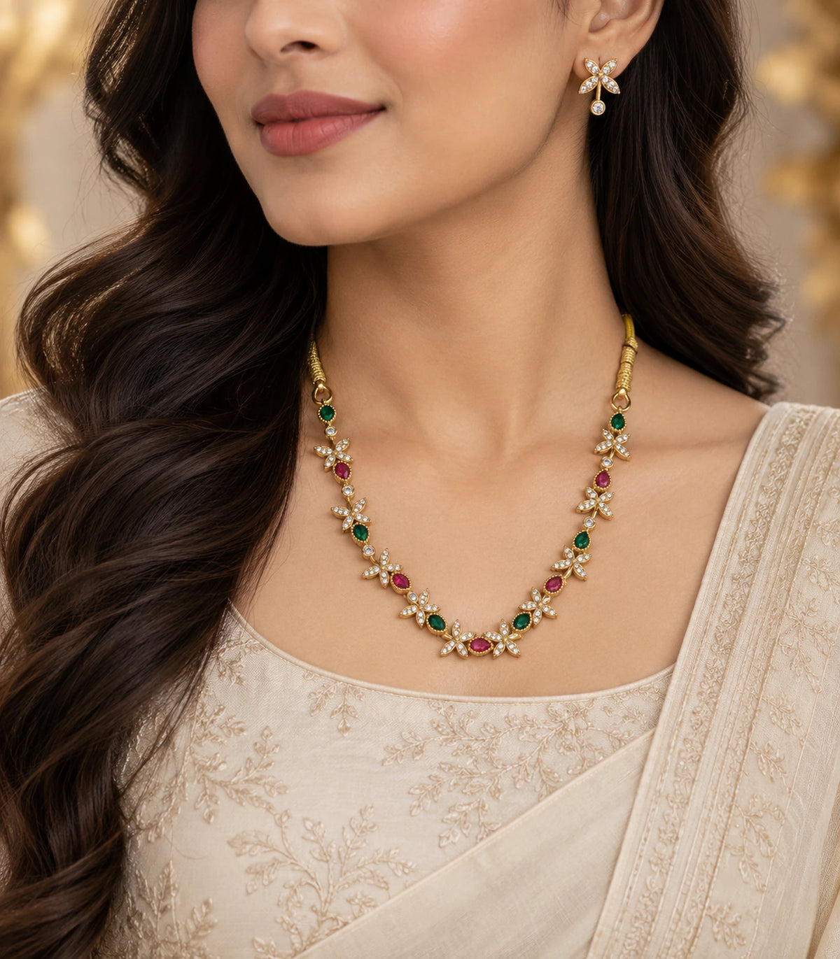Gold multicolor floral necklace and matching earring worn with embroidered clothing