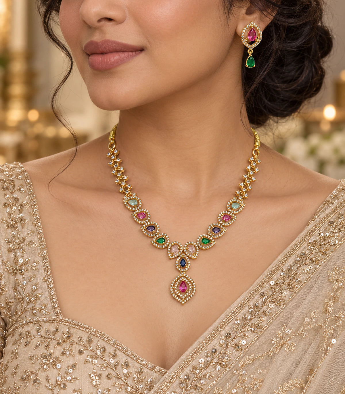 Gold-tone multicolor teardrop necklace set and matching drop earring in an occasion outfit