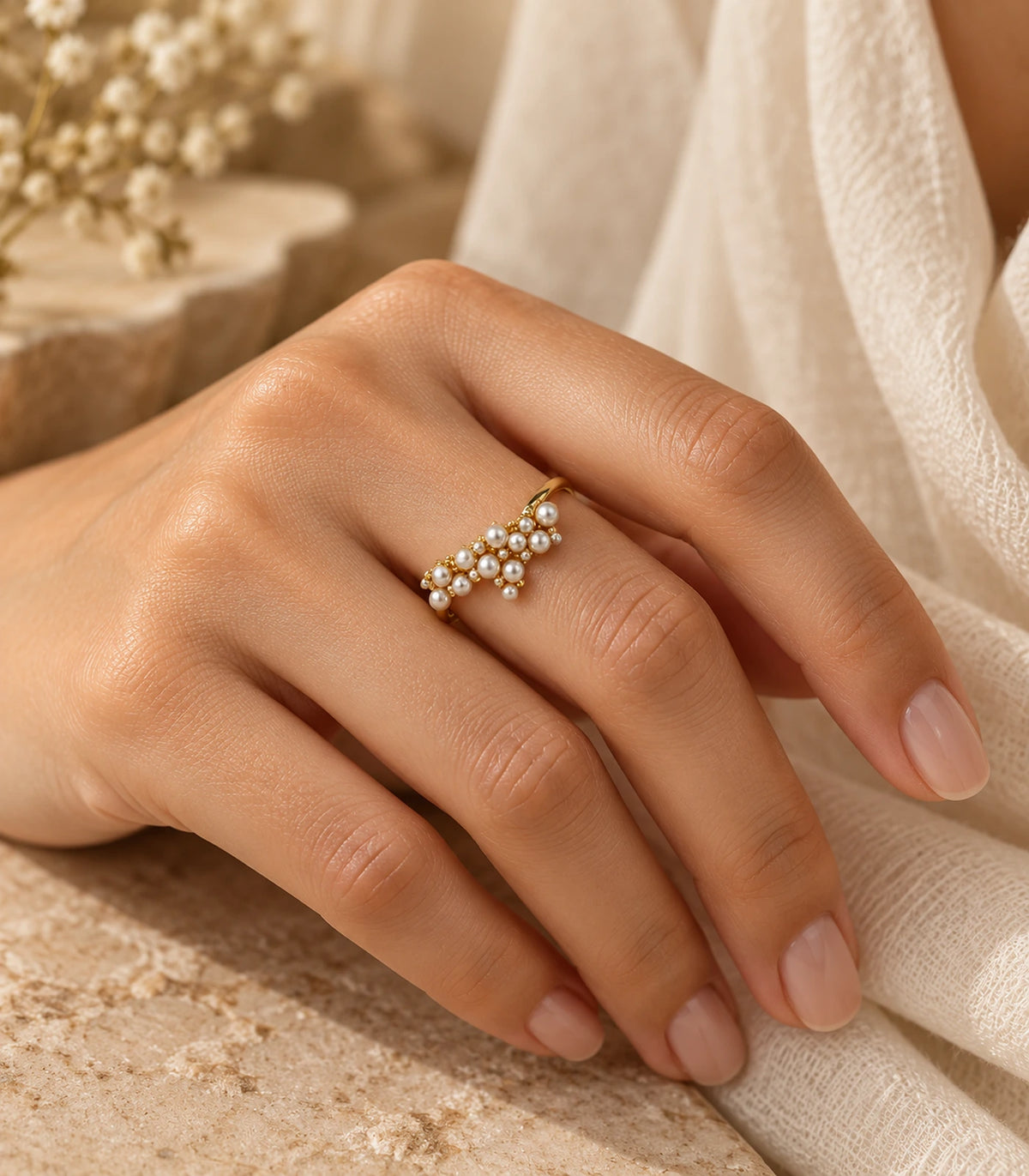 Gold Pearl Cluster Crossover Ring styled on a hand
