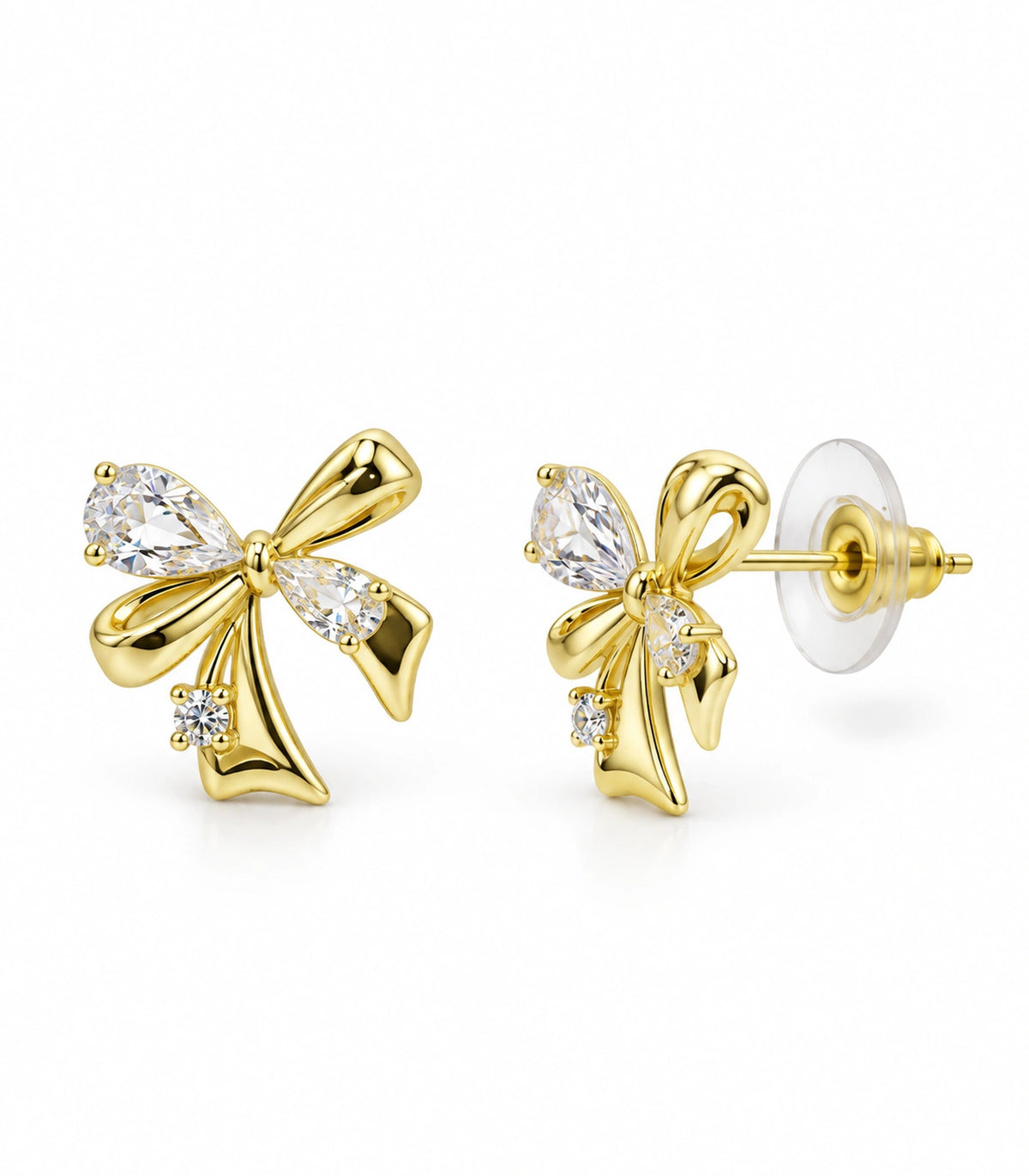 JIMIKI Asymmetric Crystal Bow Stud Earring Pair in Gold / Clear, white background product view #color_gold / clear
