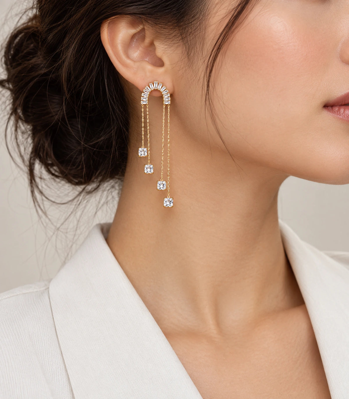JIMIKI Gold-Tone Crescent Crystal Chain Drop Earrings — earrings styled with an outfit #color_gold-tone / clear