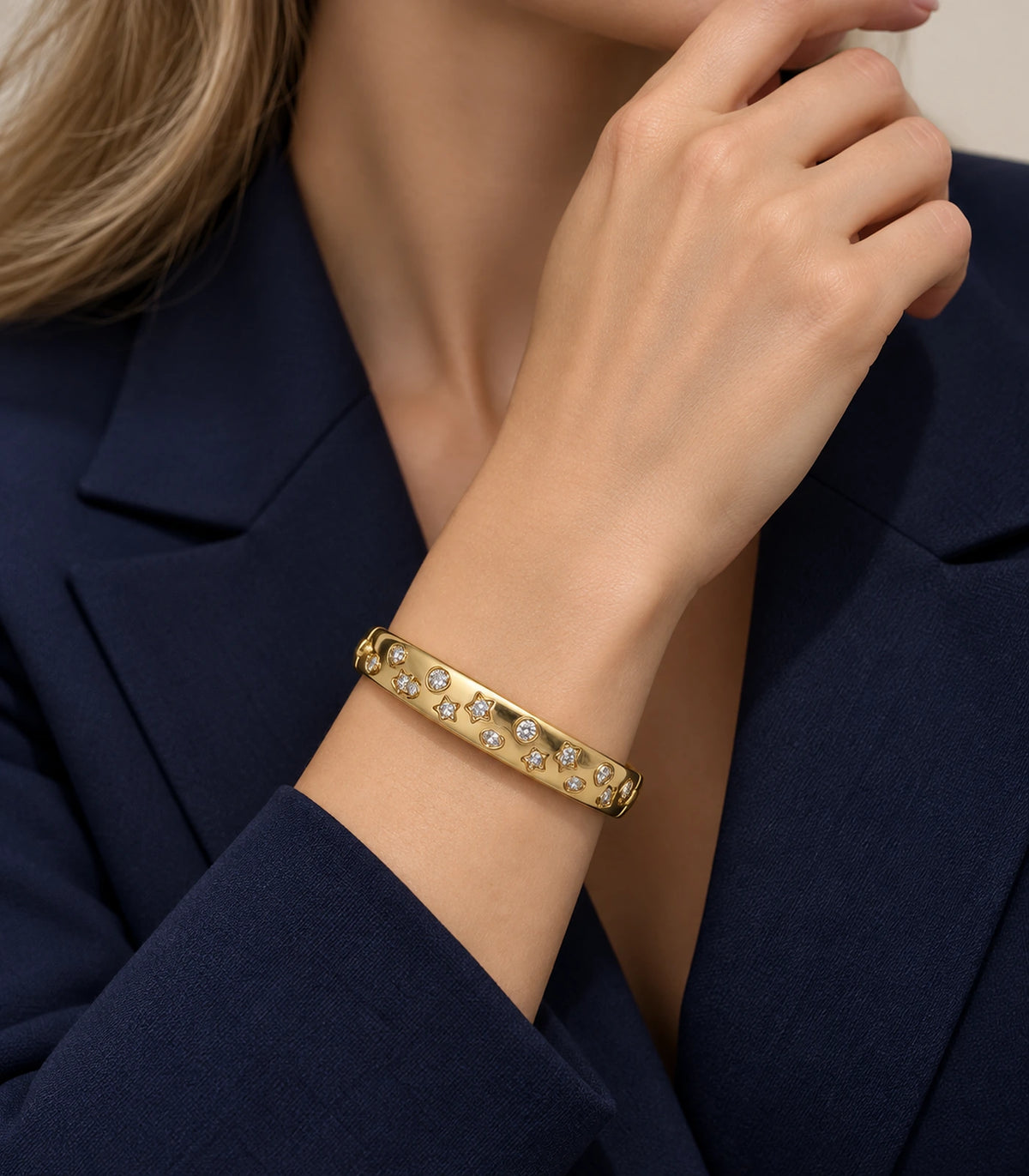 JIMIKI Gold-Tone Celestial Crystal Bangle — bangle styled with an outfit #color_gold-tone / clear