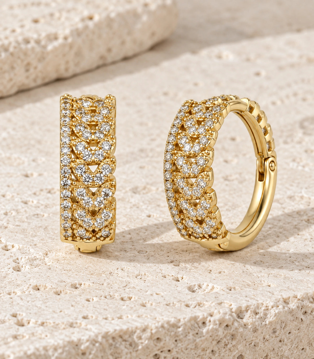 JIMIKI Crystal Chain Pattern Hoop Earring Pair in Gold tone/Clear, editorial flat lay #color_gold tone/clear