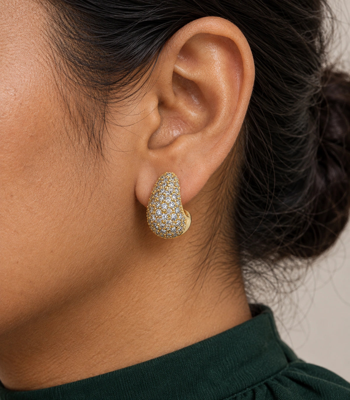 JIMIKI Gold Tone Clear Pave Teardrop Stud Earring Pair in Gold-tone, close-up detail