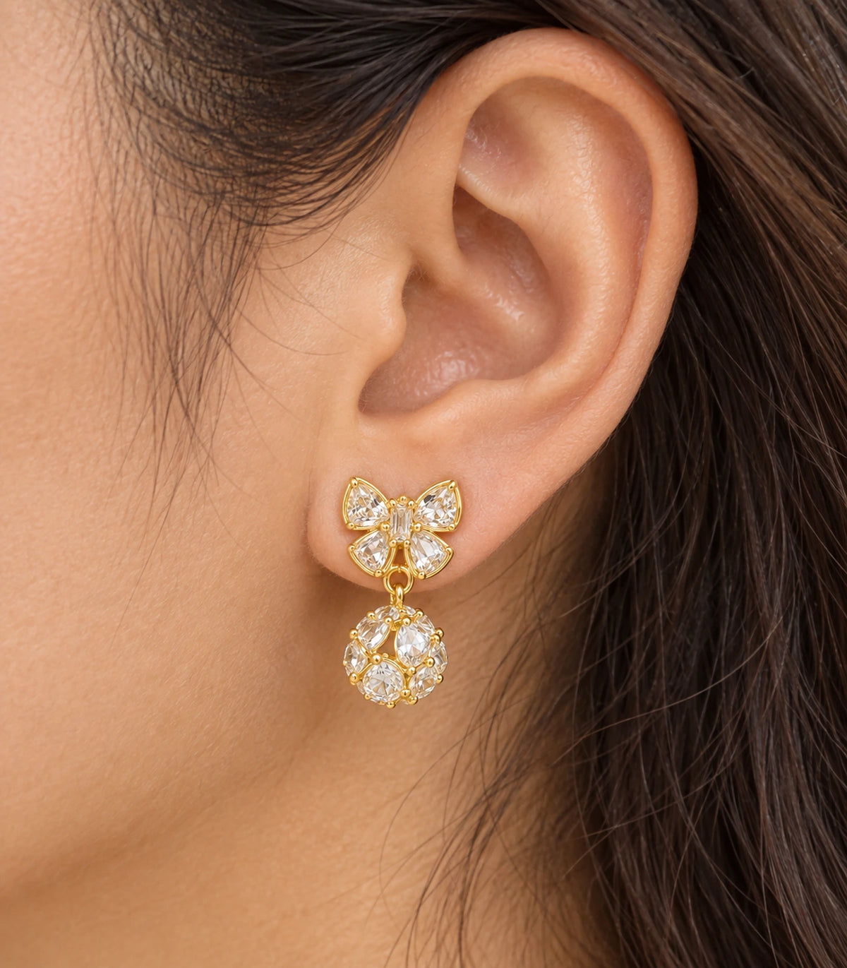 JIMIKI Gold-Tone Crystal Butterfly Ball Drop Earrings — close-up of the earring design #color_gold-tone / clear