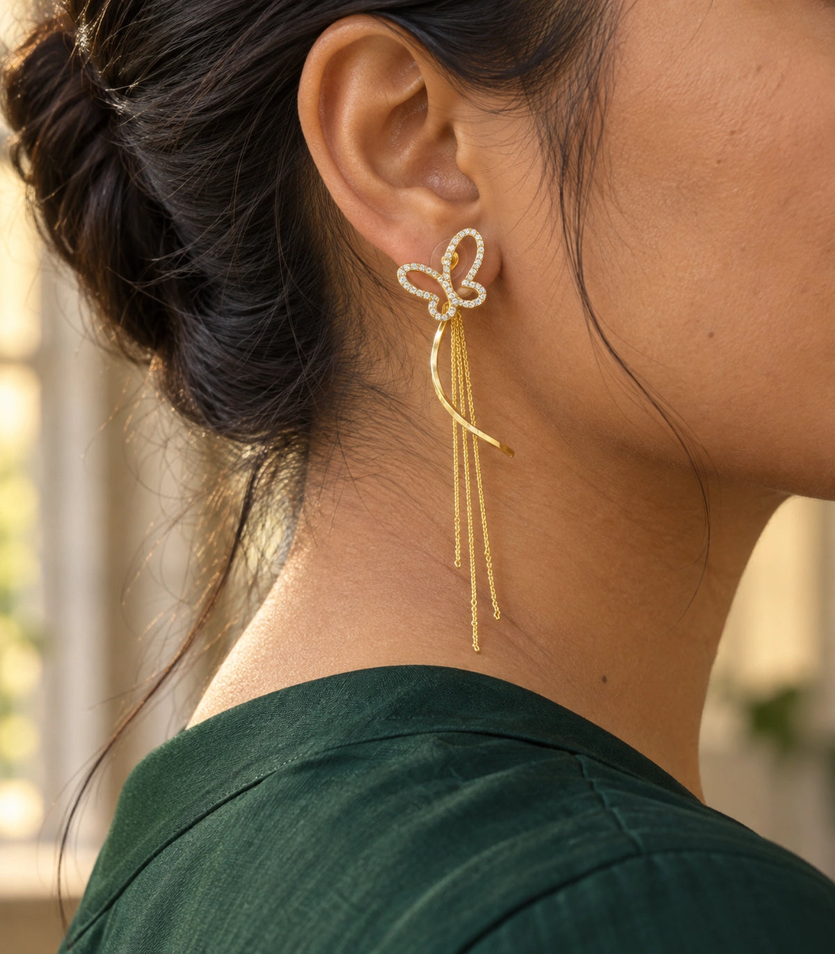 JIMIKI Butterfly Ribbon Chain Drop Earrings in Gold-tone, editorial model view #color_gold-tone