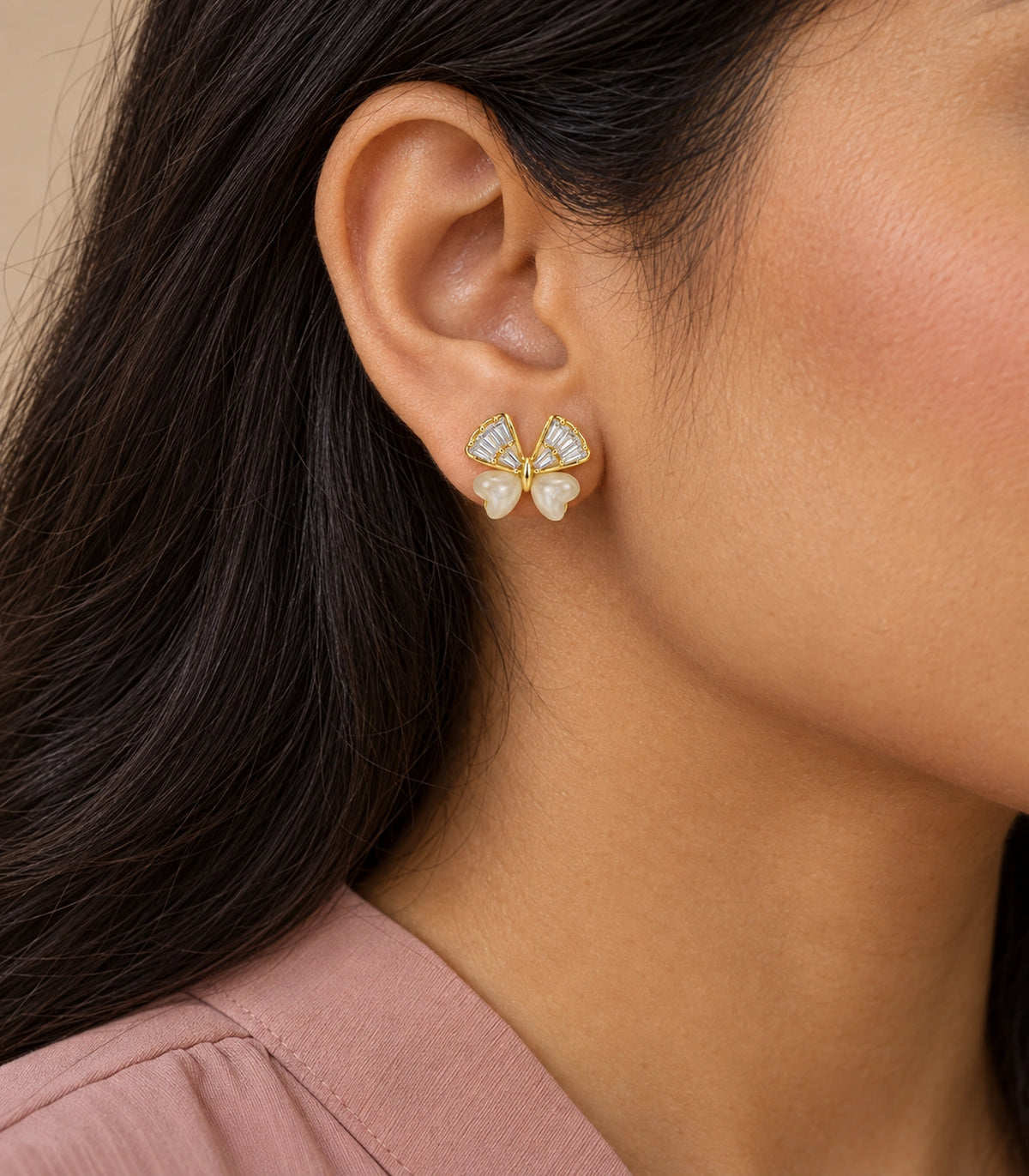 JIMIKI Crystal Wing Butterfly Stud Earring Pair in Gold Tone, model wearing view #color_gold tone
