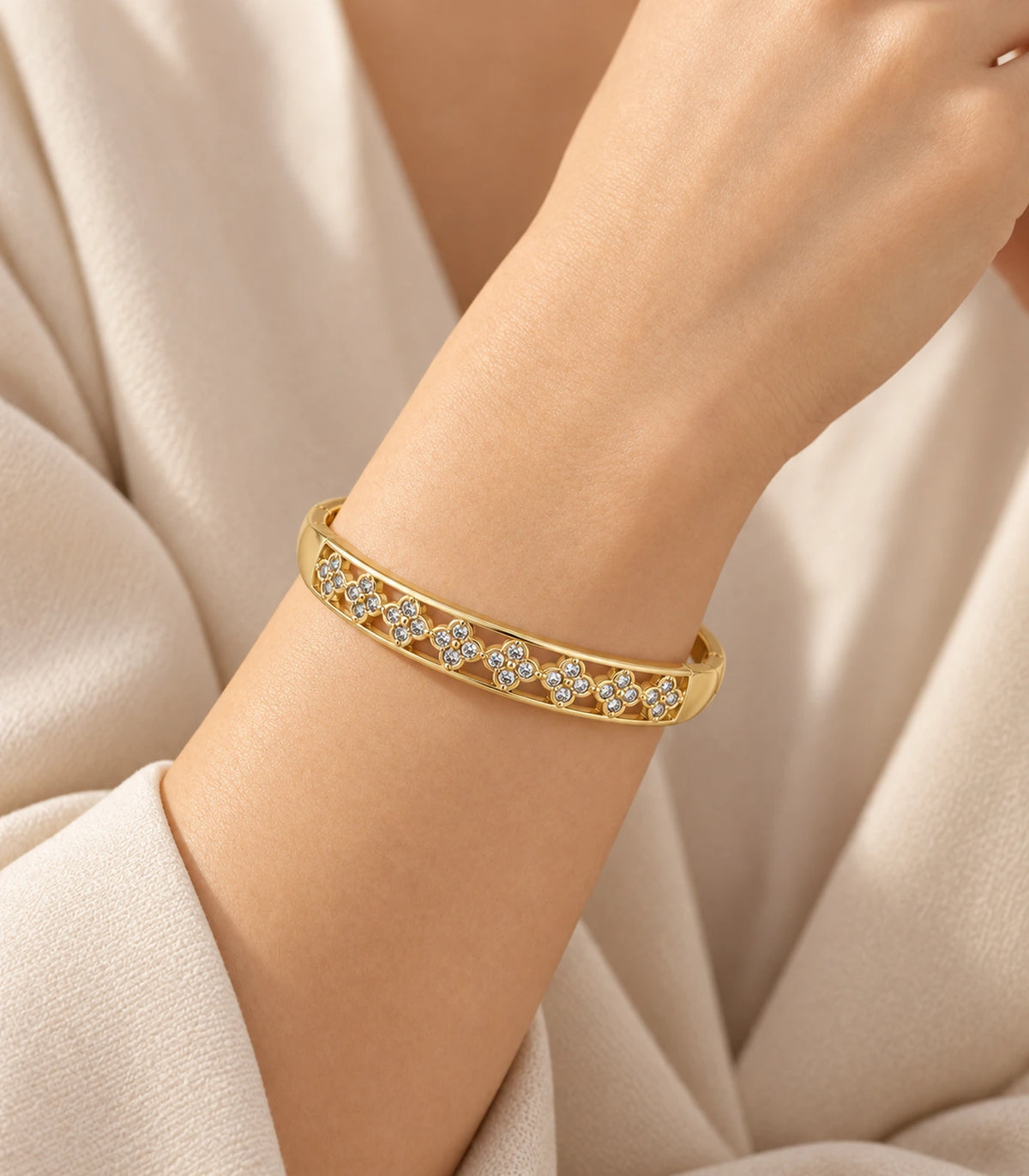 JIMIKI Gold-Tone Crystal Floral Lattice Bangle — bangle styled with an outfit #color_gold-tone / clear