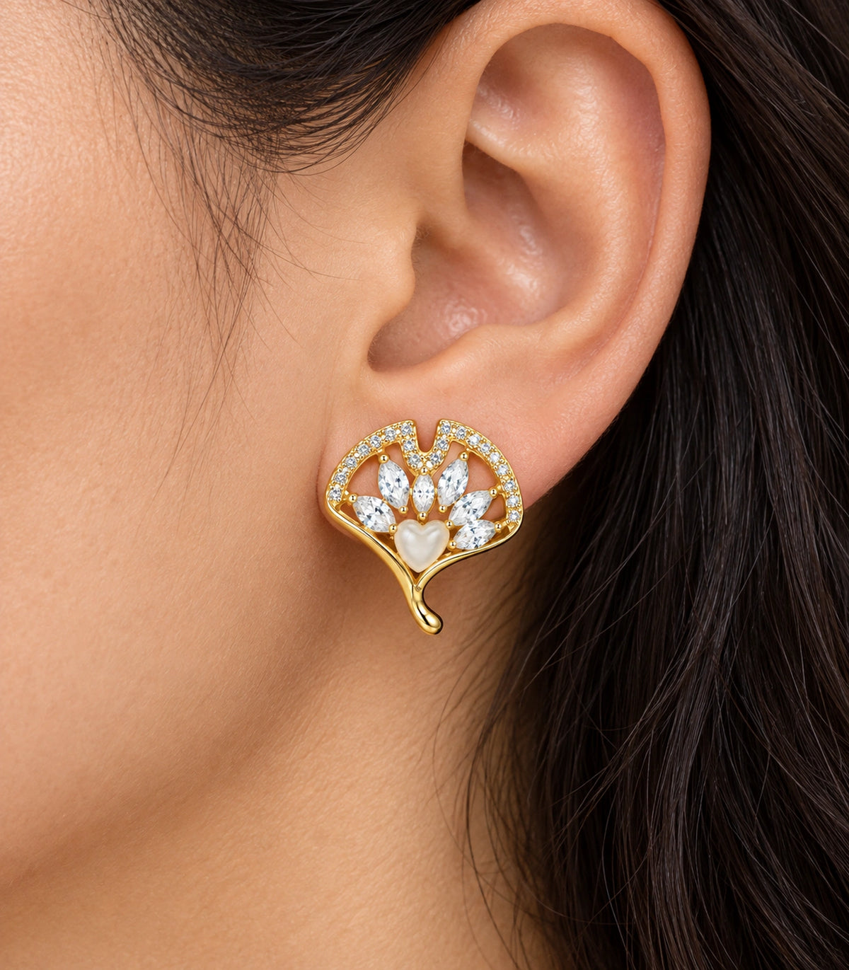 JIMIKI Gold-Tone Crystal Ginkgo Leaf Heart-Accent Stud Earrings in Gold / Clear / Milky White, close-up detail