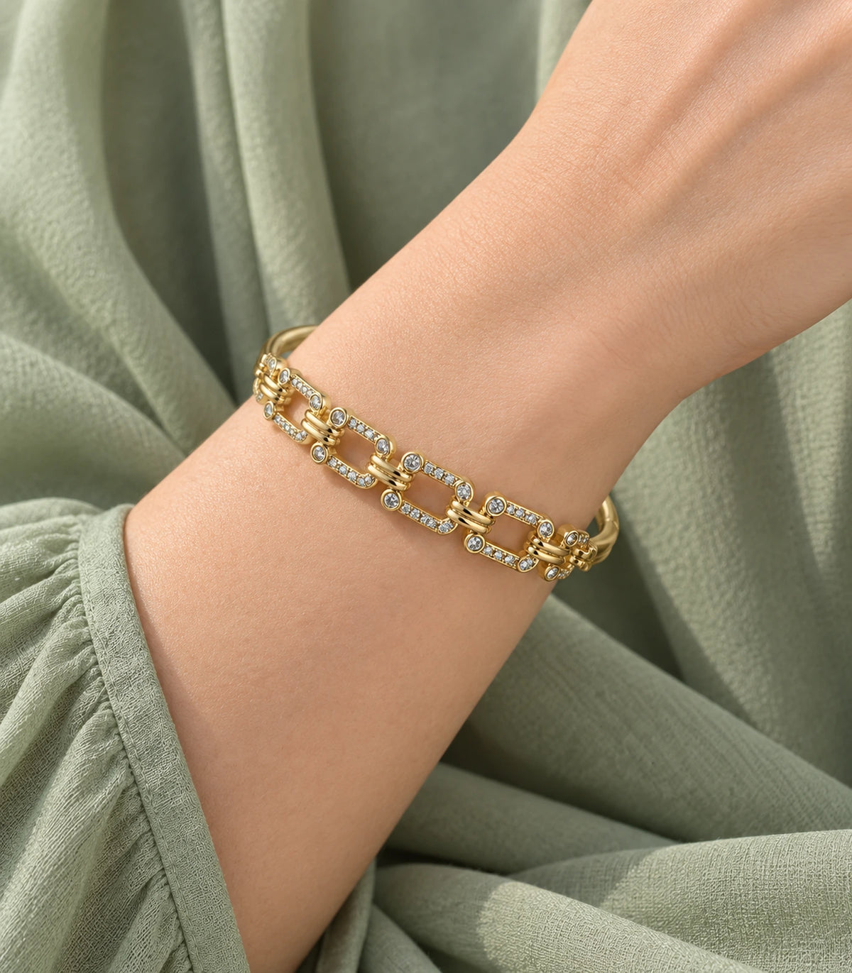 JIMIKI Gold-Tone Crystal Open Link Bangle — bangle styled with an outfit #color_gold-tone / clear