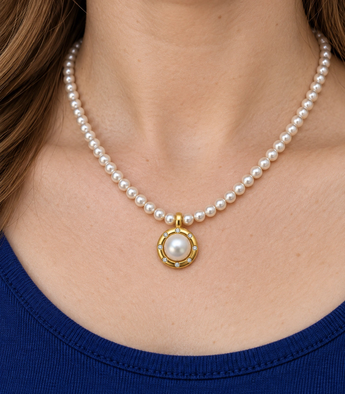 JIMIKI Gold Tone Crystal Rim Pearl Pendant Necklace in Gold / White, close-up detail