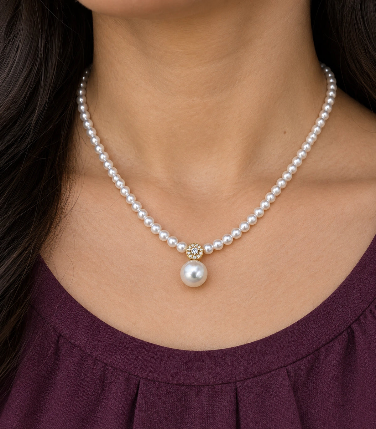 JIMIKI Gold Tone Crystal Rosette Pearl Drop Necklace in Gold / White, close-up detail