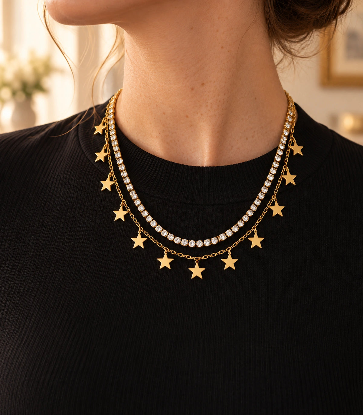 JIMIKI Gold-Tone Crystal Star Layered Necklace in Gold Tone - editorial worn view #color_gold-tone