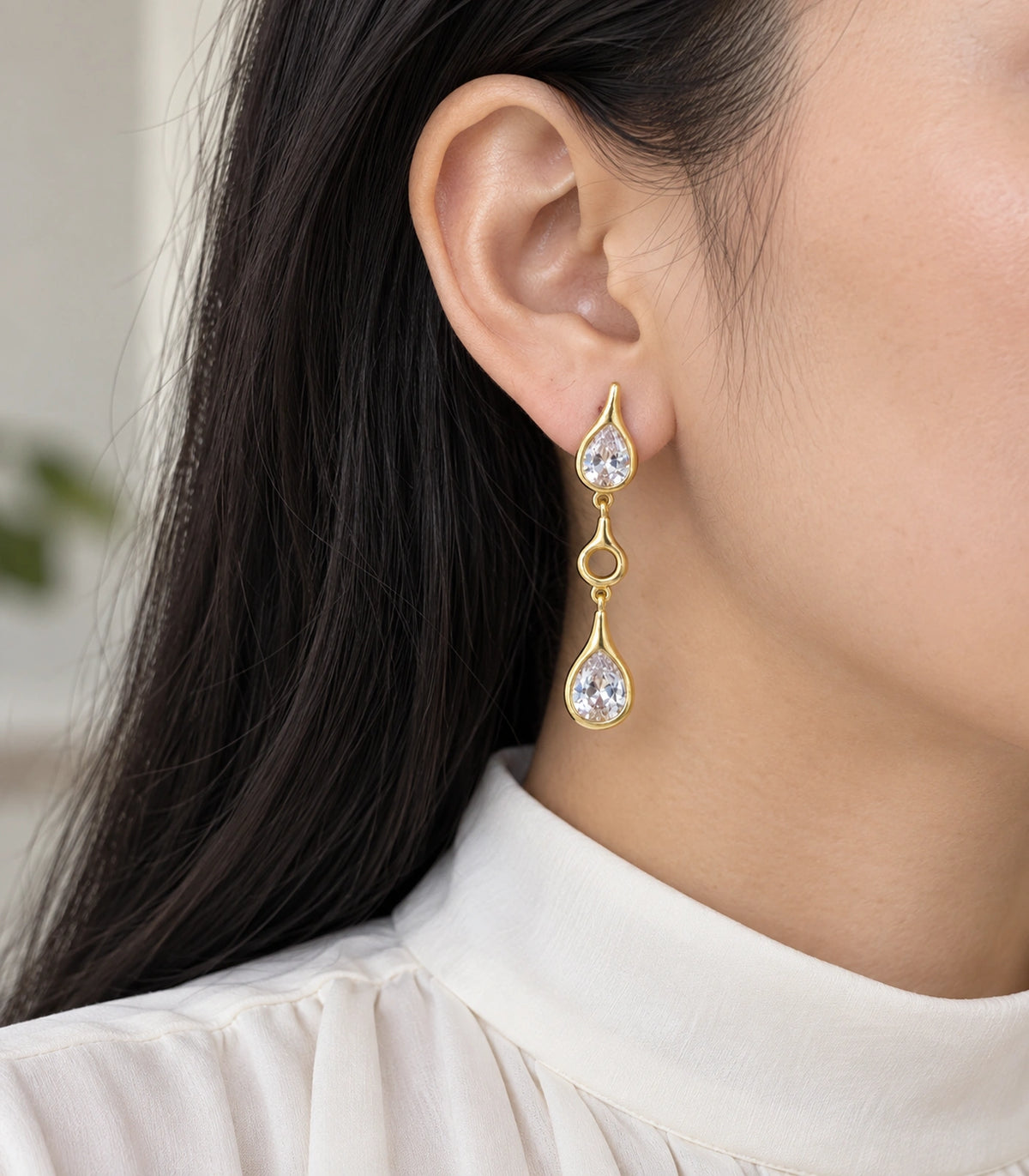 JIMIKI Crystal Teardrop Open Link Drop Earring Pair in Gold tone, model wearing view #color_gold tone