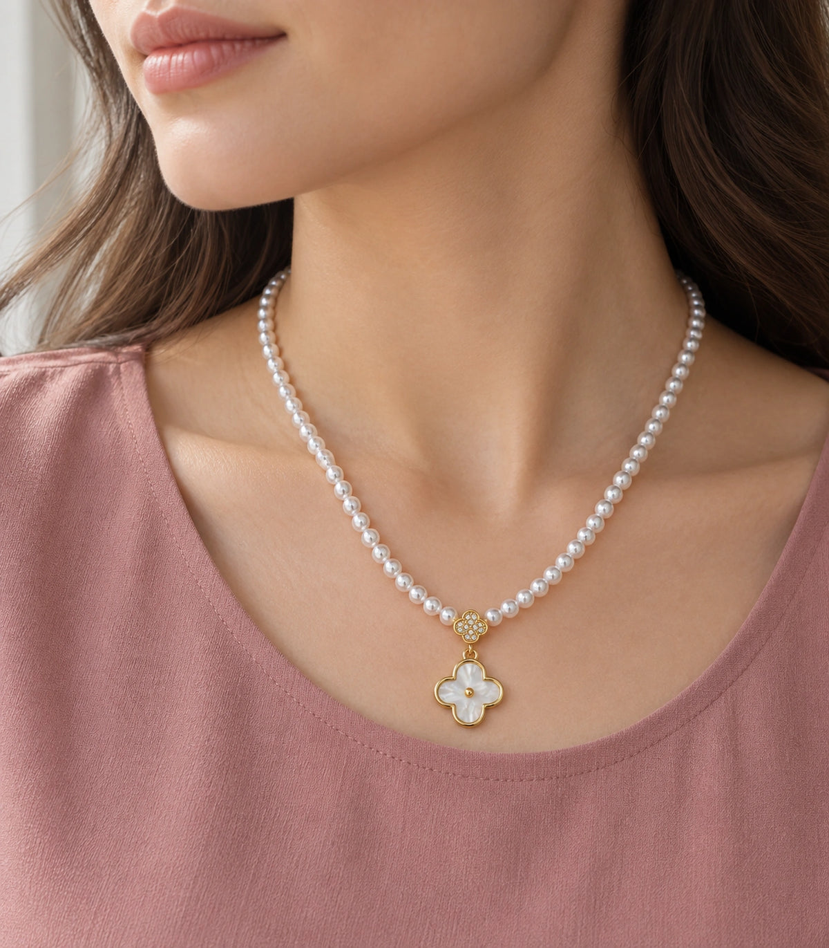 JIMIKI Gold Tone Double Clover White Inlay Pearl Necklace in Gold / White, editorial model view