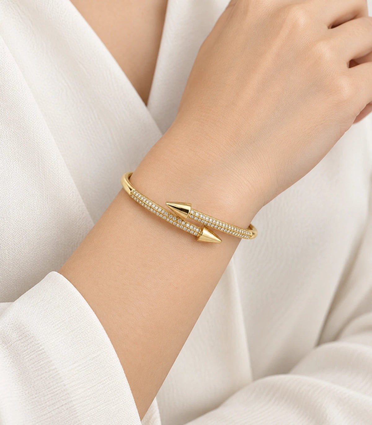 JIMIKI Gold-Tone Double Row Pavé Spear Wrap Bangle — worn on the wrist #color_gold-tone / clear