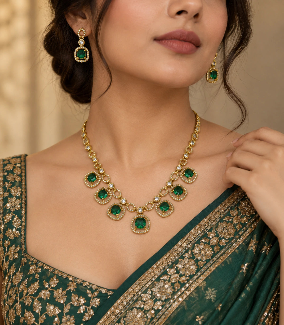 Round Crystal Teardrop Necklace Set in Emerald with gold-tone finish, editorial worn view #Color_Emerald