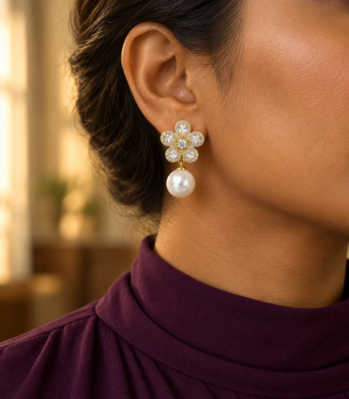 JIMIKI Five Petal Crystal Flower Pearl Drop Earring Pair in Gold-tone, editorial model view #color_gold-tone