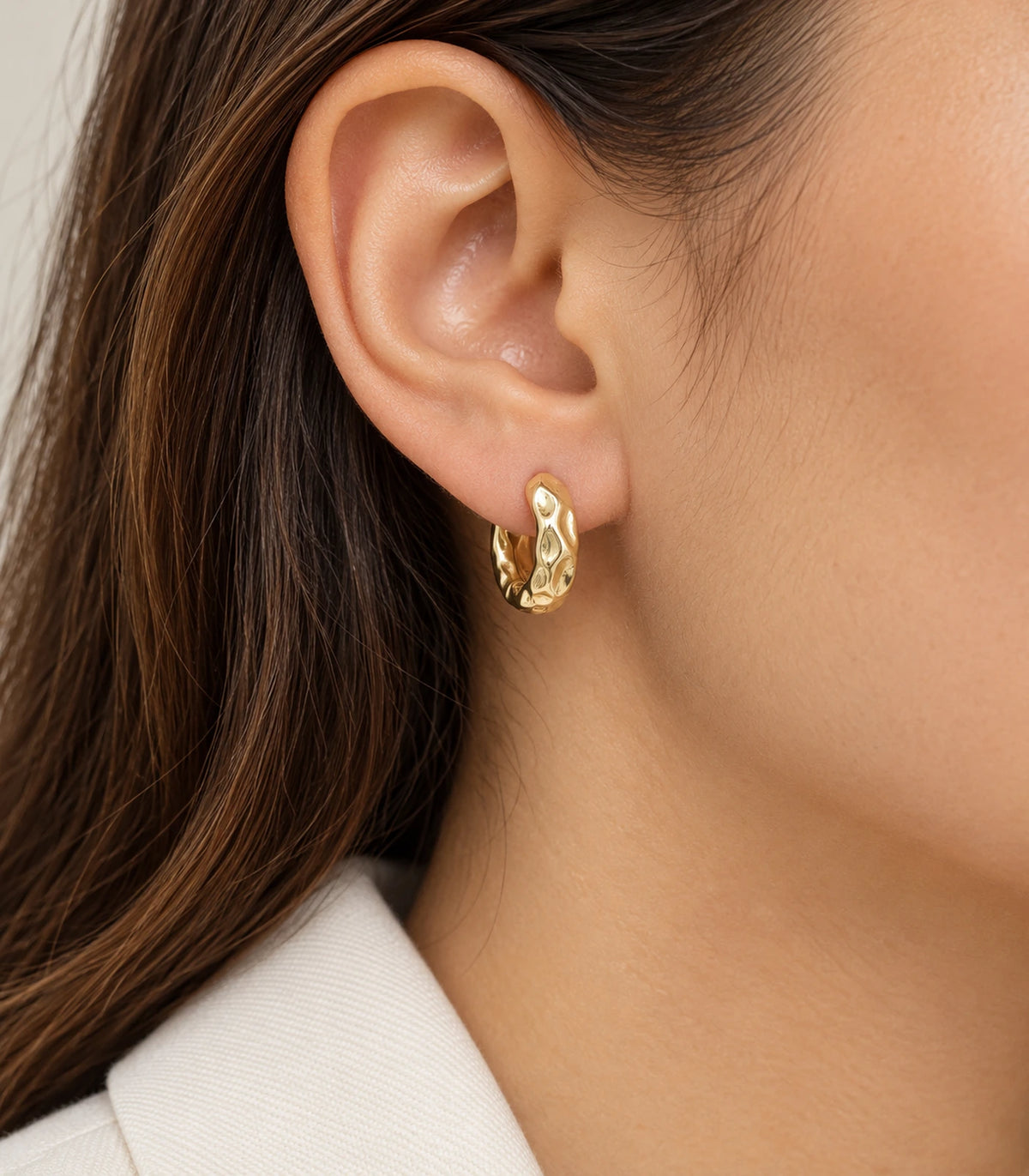 JIMIKI Gold Tone Hammered Hoop Earrings, worn styling view #color_gold-tone