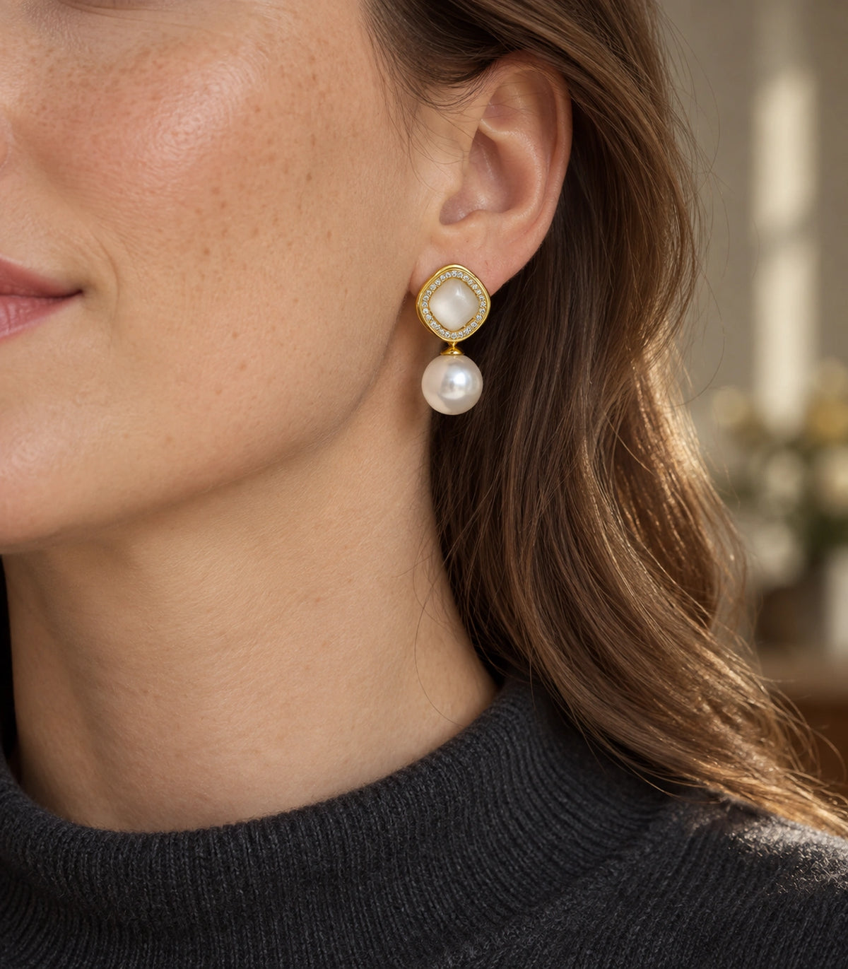 JIMIKI Crystal Halo Pearl Drop Earring Pair in Gold-tone / Ivory, editorial model view #color_gold-tone / ivory