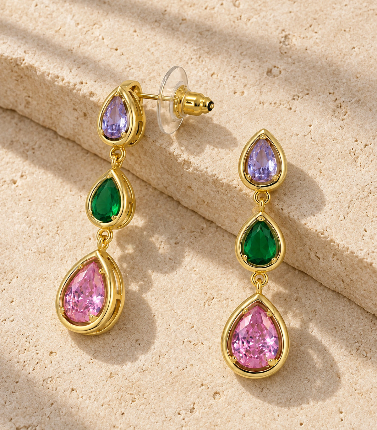 JIMIKI Gold Tone Lilac Green Pink Triple Teardrop Earring Pair in Gold tone / lilac, green, pink, editorial flat lay